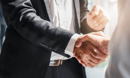 business background of businessman having handshake